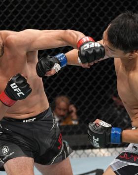 Dustin Jacoby punches Da-Un Jung of South Korea in a light heavyweight fight during the UFC Fight Night event at UBS Arena on July 16, 2022 in Elmont, New York. (Photo by Jeff Bottari/Zuffa LLC)