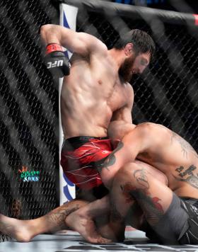 Magomed Ankalaev of Russia punches Anthony Smith in a light heavyweight fight during the UFC 277 event at American Airlines Center on July 30, 2022 in Dallas, Texas. (Photo by Chris Unger/Zuffa LLC)