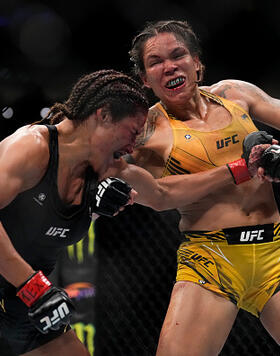 Amanda Nunes of Brazil punches Julianna Pena in the UFC bantamweight championship fight during the UFC 277 event at American Airlines Center on July 30, 2022 in Dallas, Texas. (Photo by Chris Unger/Zuffa LLC)
