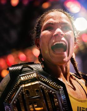 Amanda Nunes of Brazil celebrates after defeating Julianna Pena in their bantamweight title bout during UFC 277 at American Airlines Center on July 30, 2022 in Dallas, Texas. Amanda Nunes won via unanimous decision. (Photo by Carmen Mandato/Getty Images)