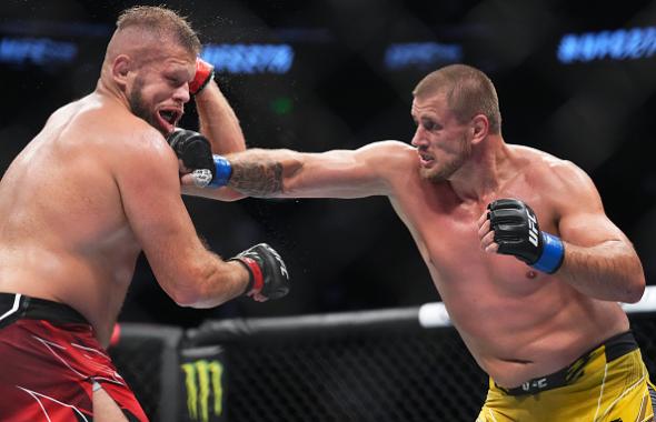 Alexandr Romanov of Moldova punches Marcin Tybura of Poland in a heavyweight fight during the UFC 278 event at Vivint Arena on August 20, 2022 in Salt Lake City, Utah. (Photo by Chris Unger/Zuffa LLC)