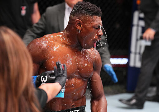 Joaquin Buckley reacts by pouring a bottle of Prime Hydration over himself after knocking out Andre Fialho of Portugal in a welterweight fight during the UFC Fight Night event at UFC APEX on May 20, 2023 in Las Vegas, Nevada. (Photo by Chris Unger/Zuffa LLC)