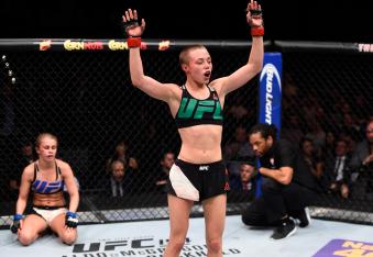 LAS VEGAS, NEVADA - DECEMBER 10:  (R-L) Rose Namajunas celebrates her submission victory over Paige VanZant in their women's strawweight bout during the UFC Fight Night event at The Chelsea at the Cosmopolitan of Las Vegas on December 10, 2015 in Las Vegas, Nevada.  (Photo by Jeff Bottari/Zuffa LLC via Getty Images)