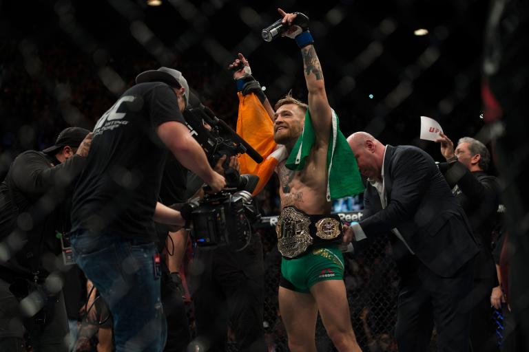 UFC featherweight champion Conor McGregor celebrates his 13 second knockout victory over Jose Aldo in their featherweight championship fight during the UFC 194 event inside MGM Grand Garden Arena on December 12, 2015 in Las Vegas, Nevada. (Photo by Brandon Magnus/Zuffa LLC)