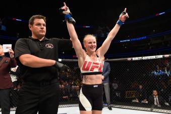 CHICAGO, IL - JULY 23:  Valentina Shevchenko of Kyrgyzstan celebrates after defeating Holly Holm by unanimous decision in their women's bantamweight bout during the UFC Fight Night event at the United Center on July 23, 2016 in Chicago, Illinois. (Photo by Josh Hedges/Zuffa LLC via Getty Images)