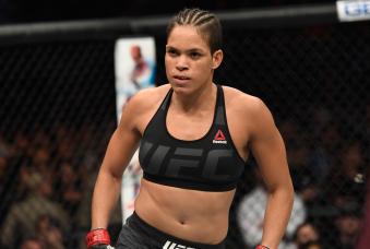 Amanda Nunes looks to the crowd in her UFC women's bantamweight championship bout during the UFC 207 event at T-Mobile Arena on December 30, 2016 in Las Vegas, Nevada.