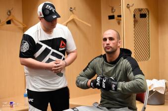 HOUSTON, TX - FEBRUARY 04:  Volkan Oezdemir of Switzerland puts on his gloves backstage during the UFC Fight Night event at the Toyota Center on February 4, 2017 in Houston, Texas. (Photo by Mike Roach/Zuffa LLC via Getty Images)