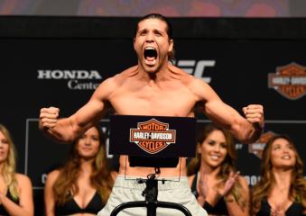 ANAHEIM, CA - JULY 28:   Brian Ortega poses on the scale during the UFC 214 weigh-in inside the Honda Center on July 28, 2017 in Anaheim, California. (Photo by Josh Hedges/Zuffa LLC via Getty Images)
