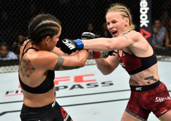 EDMONTON, AB - SEPTEMBER 09:  (R-L) Valentina Shevchenko of Kyrgyzstan punches Amanda Nunes of Brazil in their women's bantamweight bout during the UFC 215 event inside the Rogers Place on September 9, 2017 in Edmonton, Alberta, Canada. (Photo by Jeff Bottari/Zuffa LLC via Getty Images)