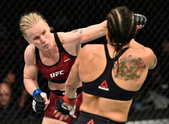 EDMONTON, AB - SEPTEMBER 09:  (L-R) Valentina Shevchenko of Kyrgyzstan punches Amanda Nunes of Brazil in their women's bantamweight bout during the UFC 215 event inside the Rogers Place on September 9, 2017 in Edmonton, Alberta, Canada. (Photo by Jeff Bottari/Zuffa LLC via Getty Images)