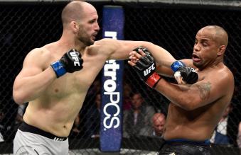 BOSTON, MA - JANUARY 20:  (L-R) Volkan Oezdemir of Switzerland punches Daniel Cormier in their light heavyweight championship bout during the UFC 220 event at TD Garden on January 20, 2018 in Boston, Massachusetts. (Photo by Jeff Bottari/Zuffa LLC via Getty Images)