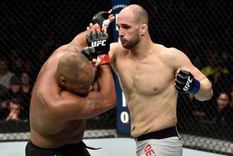 BOSTON, MA - JANUARY 20:  (R-L) Volkan Oezdemir of Switzerland punches Daniel Cormier in their light heavyweight championship bout during the UFC 220 event at TD Garden on January 20, 2018 in Boston, Massachusetts. (Photo by Jeff Bottari/Zuffa LLC via Getty Images)