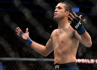 LAS VEGAS, NV - MARCH 03:   Brian Ortega celebrates after knocking out Frankie Edgar in their featherweight bout during the UFC 222 event inside T-Mobile Arena on March 3, 2018 in Las Vegas, Nevada. (Photo by Brandon Magnus/Zuffa LLC via Getty Images)