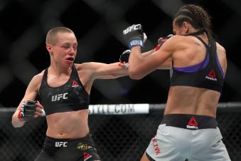 NEW YORK, NY - APRIL 07: UFC strawweight champion Rose Namajunas (L) throws a left hand at Joanna Jedrzejczyk (R) during their UFC women's strawweight championship bout at UFC 223 at Barclays Center on April 7, 2018 in New York City. (Photo by Ed Mulholland/Getty Images)