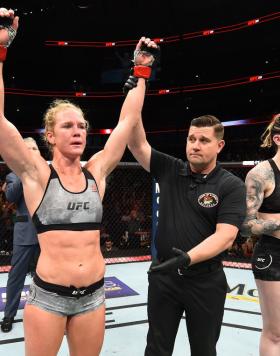 Holly Holm celebrates after defeating Megan Anderson of Australia in their women's featherweight fight during the UFC 225 event at the United Center on June 9, 2018 in Chicago, Illinois. (Photo by Josh Hedges/Zuffa Getty Images)