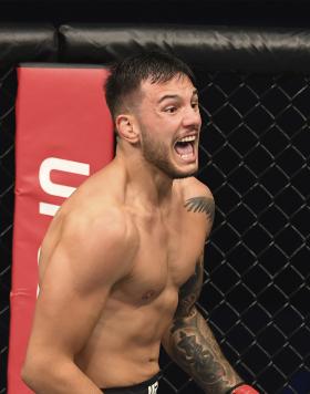 Luigi Vendramini of Brazil celebrates after defeating Jessin Ayari in their lightweight bout during the UFC Fight Night event inside Flash Forum on UFC Fight Island on October 04, 2020 in Abu Dhabi, United Arab Emirates. (Photo by Josh Hedges/Zuffa LLC)
