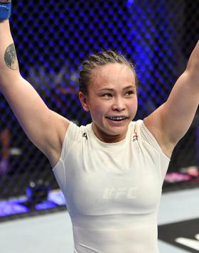Michelle Waterson reacts after the conclusion of her strawweight fight against Carla Esparza during the UFC 249 event at VyStar Veterans Memorial Arena on May 09, 2020 in Jacksonville, Florida. (Photo by Jeff Bottari/Zuffa LLC)