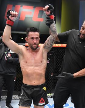Pedro Munhoz of Brazil reacts after his victory over Jimmie Rivera in a bantamweight bout during the UFC Fight Night event at UFC APEX on February 27, 2021 in Las Vegas, Nevada. (Photo by Jeff Bottari/Zuffa LLC)