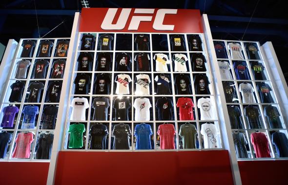 A wall of UFC branded T-shirts are displayed at the UFC Fan Expo at the Las Vegas Convention Center on July 8, 2016 in Las Vegas, Nevada. (Photo by David Becker/Zuffa LLC). Shop UFC gear at ufcstore.com. UFC T-Shirt UFC Sweatshirt UFC Hoodie UFC Poster UFC Gear UFC Clothes